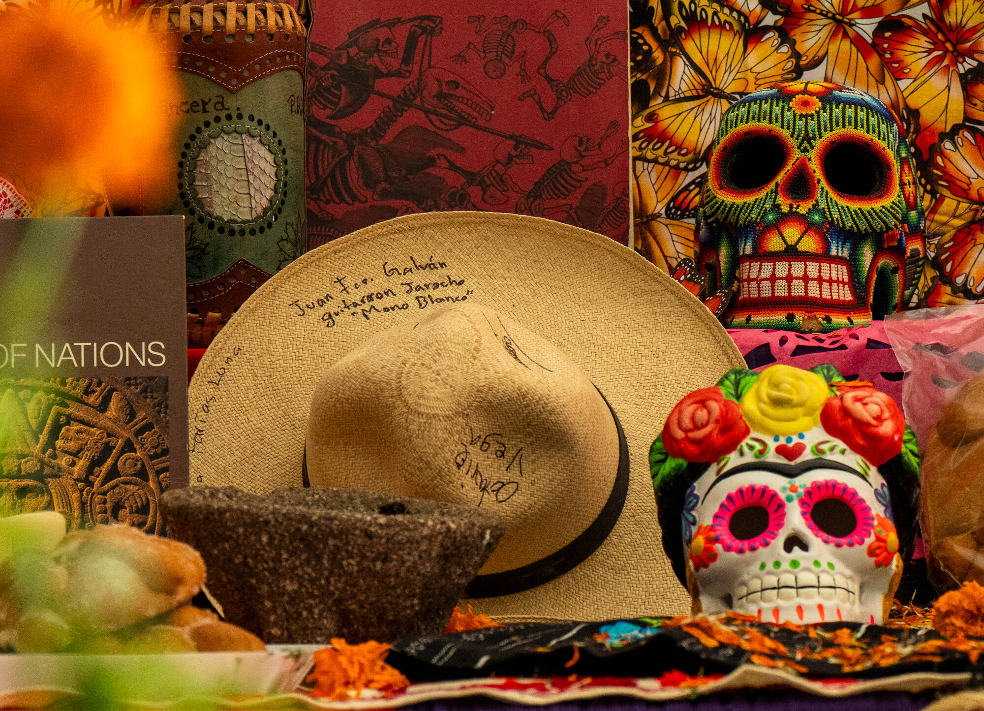 Alter details include daily use items, food, skulls and notes to those departed. Day of the Dead event in the Mary Idema Pew Library Cafe. The display will remain up until Nov. 3.  2025-10-29. Photography by Steve Jessmore